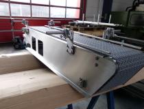 Gleitförderband mit Kunststoff-Gliedergurt für Nassbereiche Gleitförderband mit Kunststoff-Gliedergurt für Nassbereiche